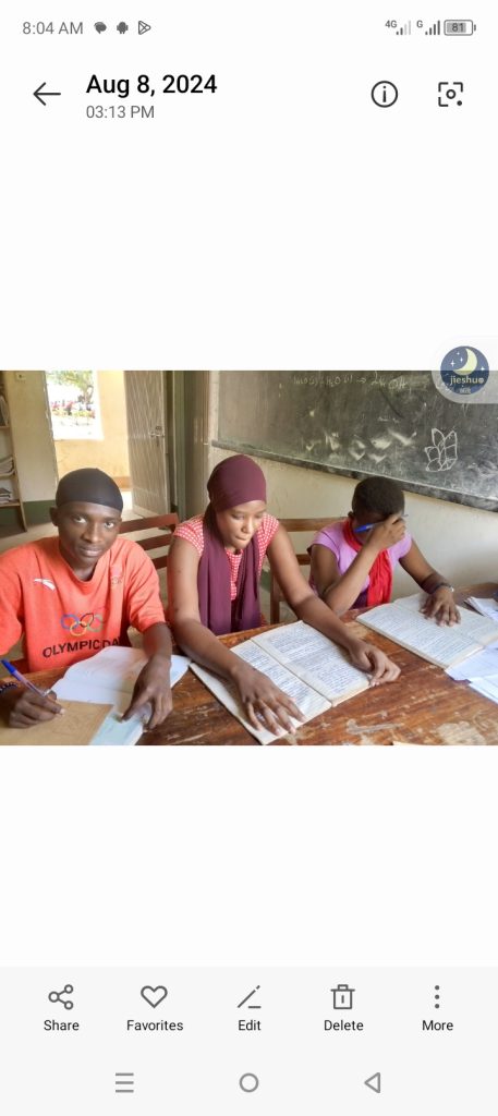 3 disabled secondary school girls reading books